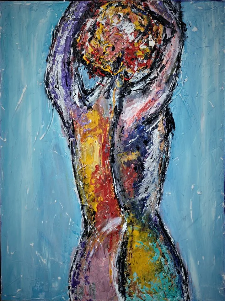 Abstract female silhouette in blue, black and warm tones